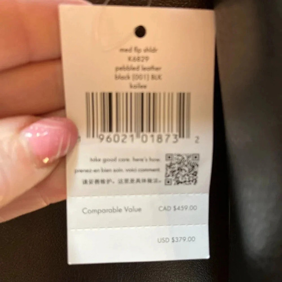 This is a NWT Kate Spade purse in black pebble leather with gold furnishings. - Picture 4 of 9